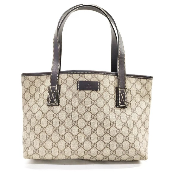 Gucci Handbags - Gucci brown PVC tote